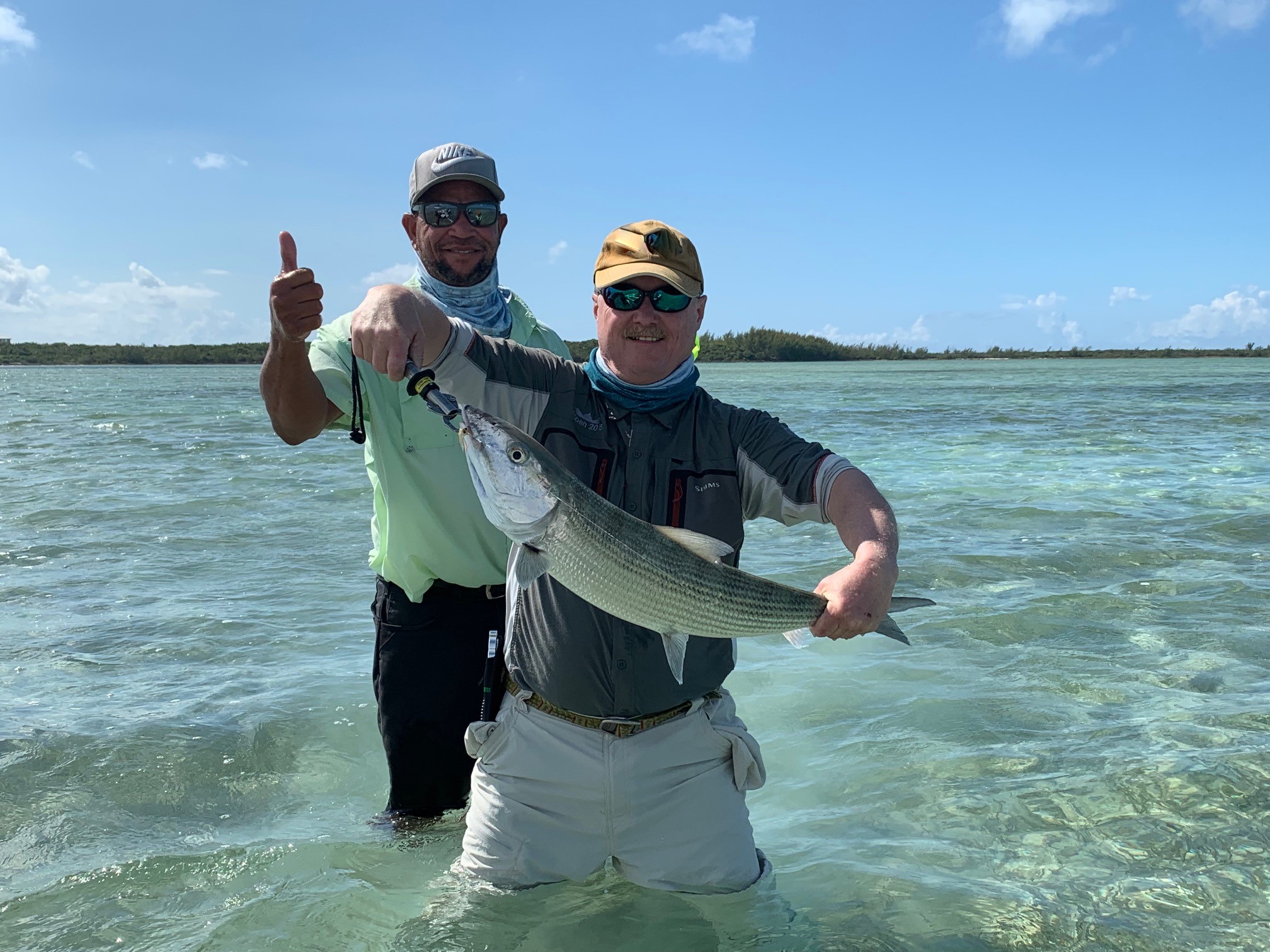 Jon and his bahamas guide showing off a bonefish