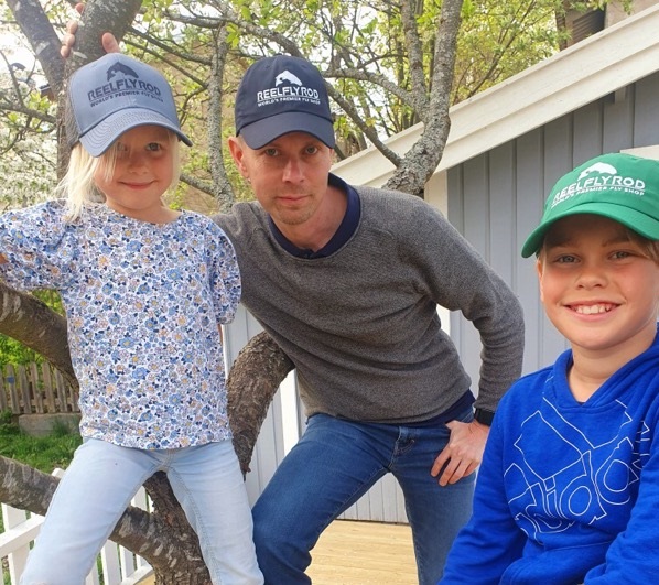 Jan and his kids sporting ReelFlyRod caps, gifts from Boris