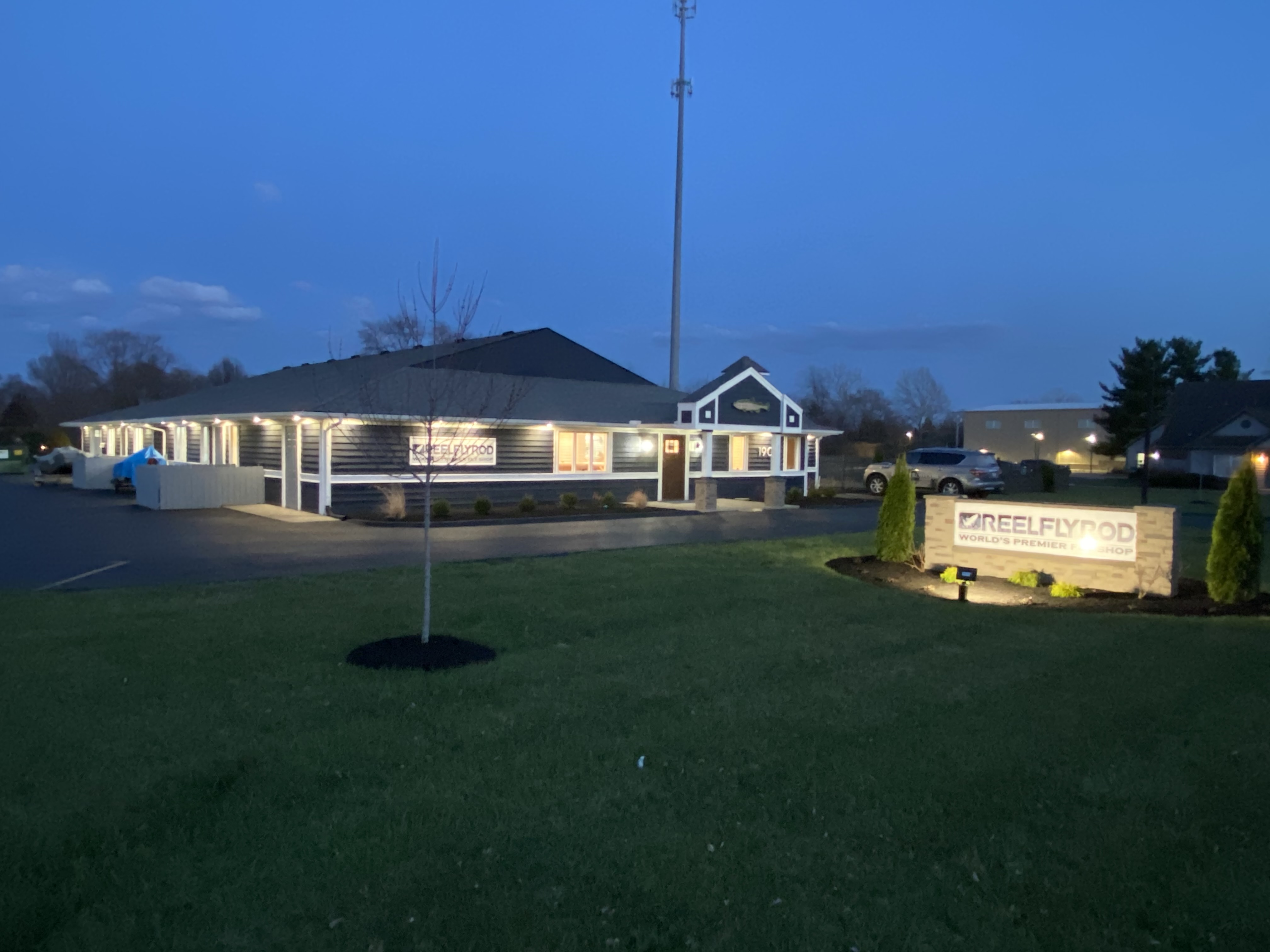 Front yard of the new building and the new sign