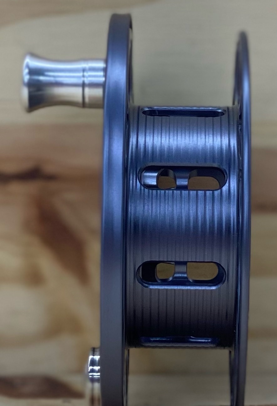 The Hatch Iconic Spool has an updated ergonomic handle and ported Arbor for lighter weight
