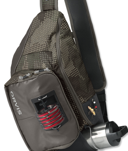 Orvis Sling Pack with tippet flies and a waterbottle