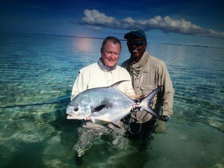 Scott and his guide with a big Permit on the Salt Flats