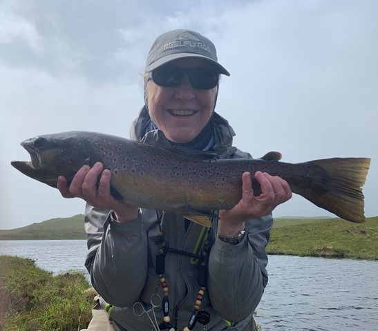 Cari holding a big ol trout